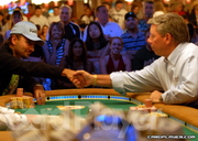 Daniel Negreanu and Mike Sexton shake hands before going heads up. Daniel Negreanu and Mike Sexton shake hands before going heads up.