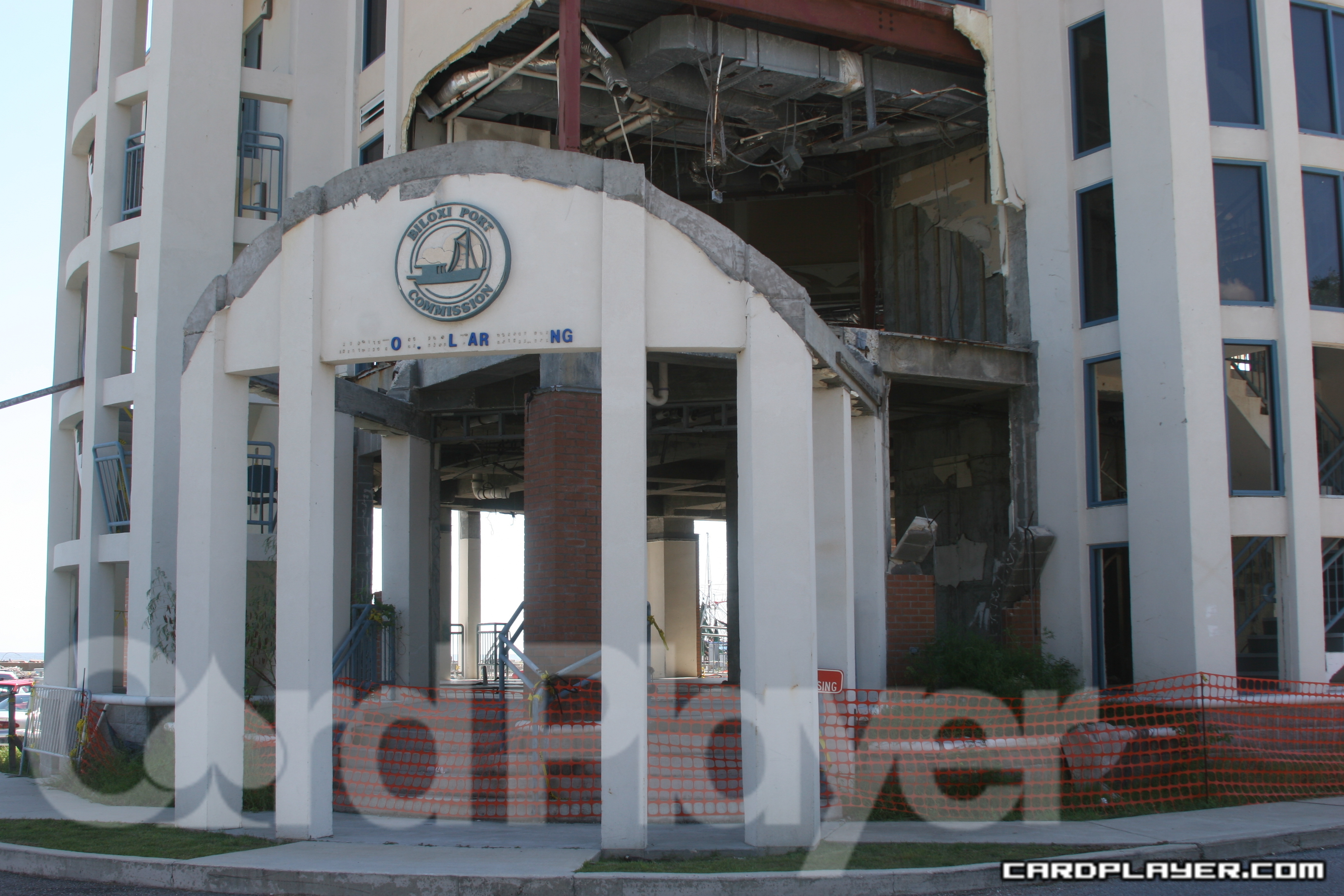 The old Biloxi Port Commission building, which now features a gaping hole and wreckage The old Biloxi Port Commission building, which now features a gaping hole and wreckage