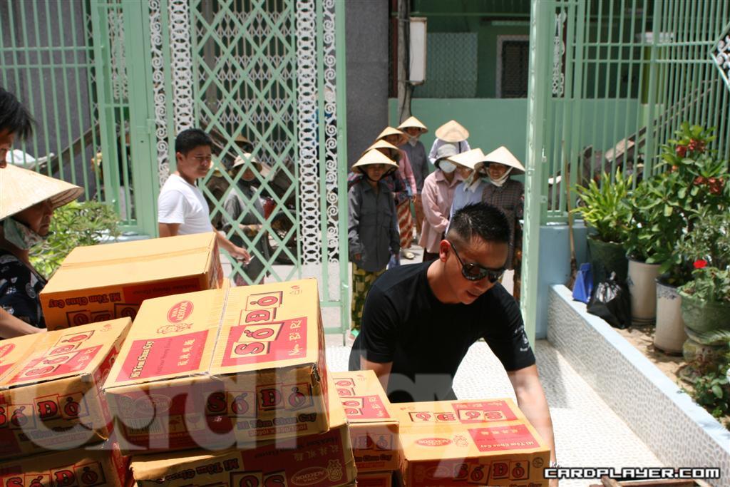 John Phan Providing Charity Aid at his Home in Vietnam John Phan Providing Charity Aid at his Home in Vietnam