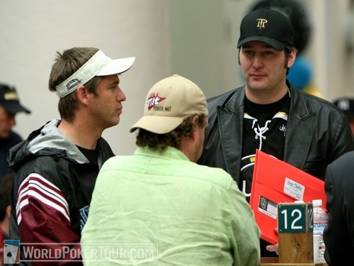 Three Shooting Stars: Phil Hellmuth and Gavin Smith talk with Layne Flack after busting out on Day 1b. Flack was one of five Shooting Stars to survive Day 1a.