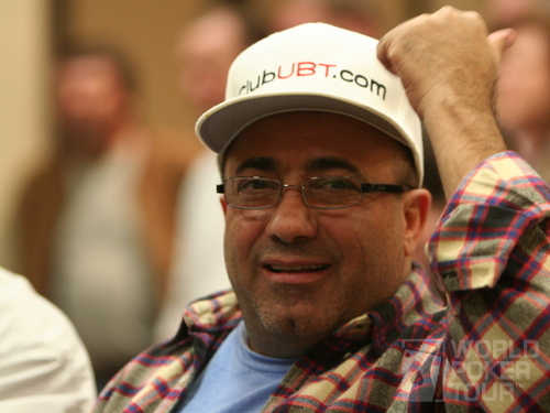 Freddy Deeb points out the sponsor on his cap on Day 1a of the WPT Tunica World Poker Open