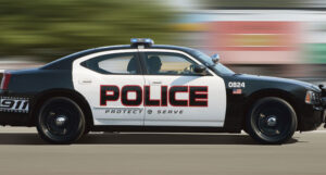 VIDEO: Cop Playing Web Poker While Driving