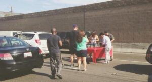 During Traffic Jam, Drivers Play Home Game