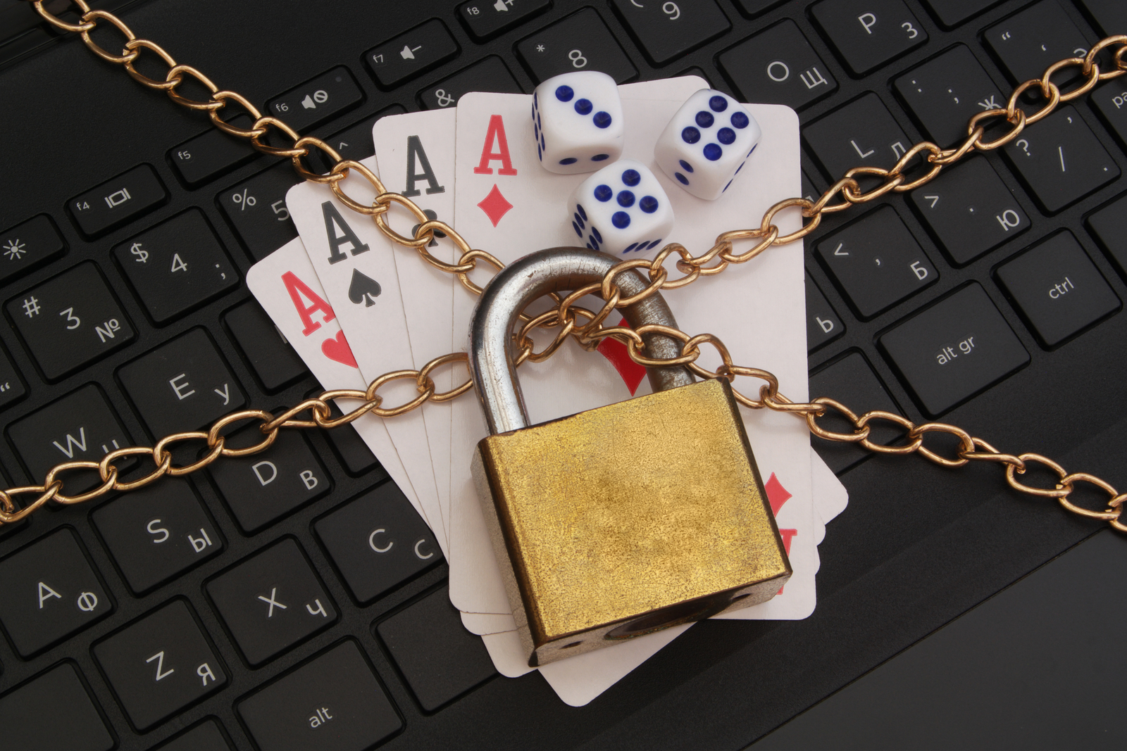 Cards on a keyboard behind a lock