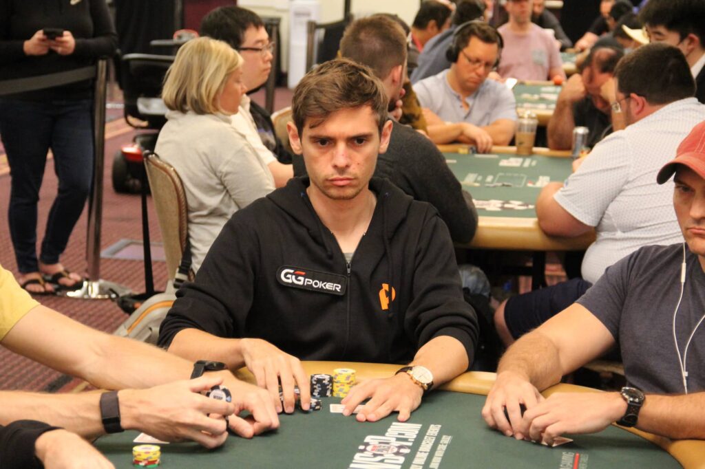 Fedor Holz playing at a live poker table during a major tournament
