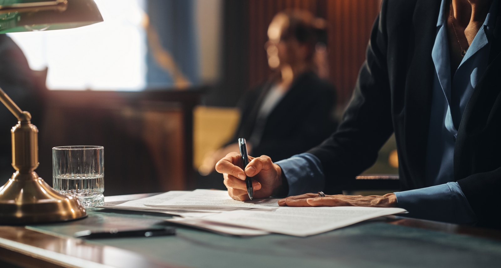 An image of legal documents being drafted