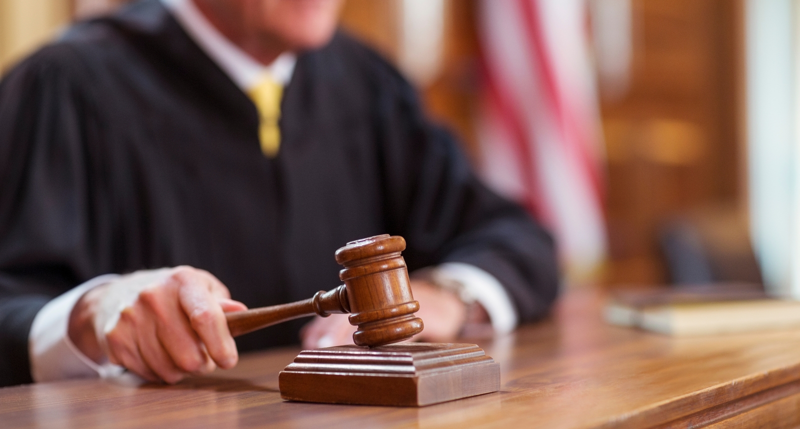 A picture of a judge banging his gavel
