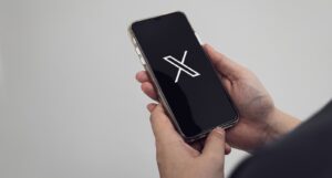 A picture of the X app on a mobile phone