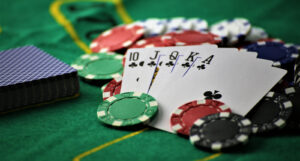 A picture of a Royal Flush on a poker table with chips