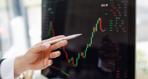 A picture of someone trading with a chart